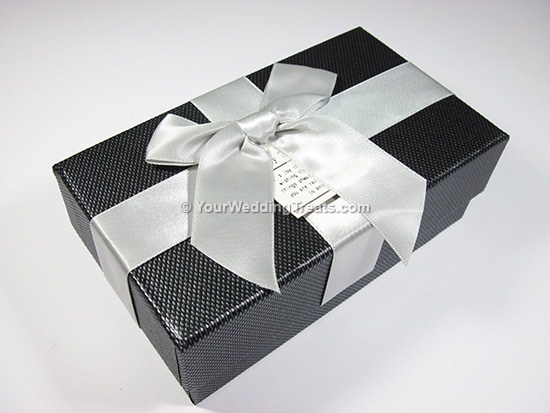 black cardboard favor box with ribbon message