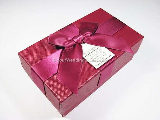 maroon cardboard favor box with ribbon message