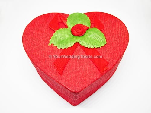 red heart shaped cardboard favor box