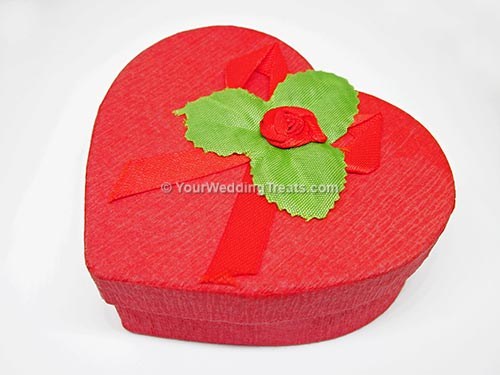 red heart shaped cardboard favor box