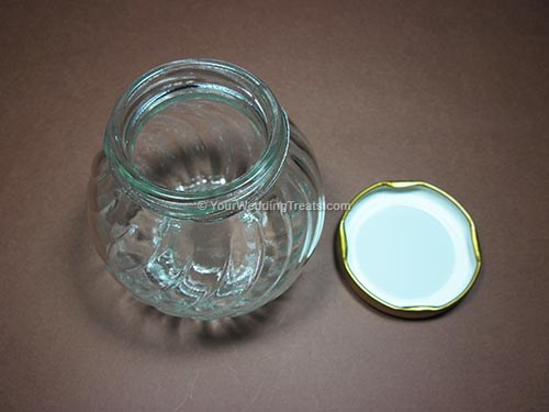 glass jar wedding favor with gold colored cover